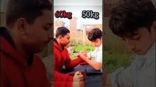 Armwrestling with big guy😱.#shorts #shortsfeed #armwrestling