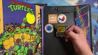 A vintage book, A vintage Magic card?