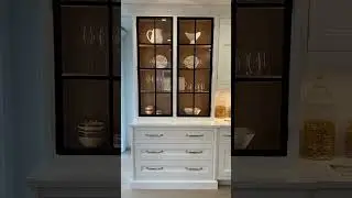 How designers style glass front cabinets