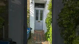 A light blue Victorian style door in London.