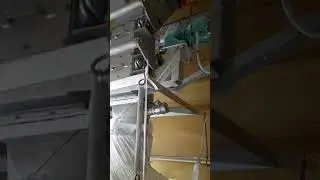 Double flap valve with motorized drive