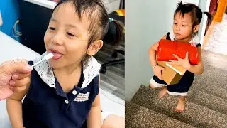 Diem is curious about the things her mother buys for the baby