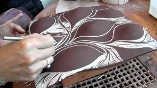 carving a tile at Natalie Blake Studios