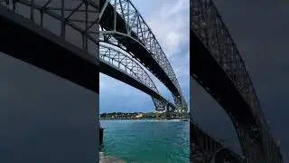 Blue water bridge at golden hour #canada #viral  #travel  #hiking #ontario #bridge