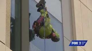 SLMPD SWAT team surprises Children's Hospital in superhero costumes