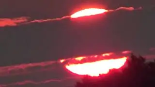 red sun rise this morning  mostly cloudy...rain on the way, 7/22/2025 530am tuesday