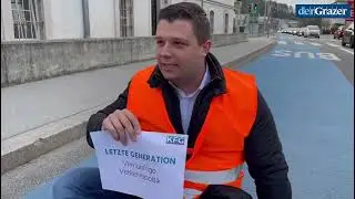 Grazer Politiker klebt sich am Radweg fest