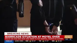 Woman in custody after barricade incident at a Phoenix motel