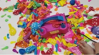 Electric balloon machine! Colourful balloons popping 