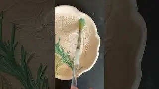 The #relaxing #pottery art process of pressing leaves and herbs into clay to make a ceramic dish