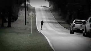 Chris on longboard doing the Hockley Hill...