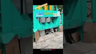 Compression technology machine pressing metal scrap into blocks