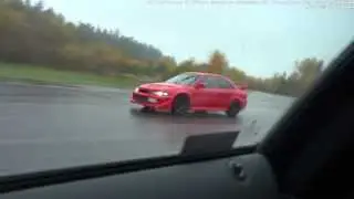Tuned Mitsubishi Evo VI E85-powered vs BMW M6 Coupe stock in the rain from a roll and standstill