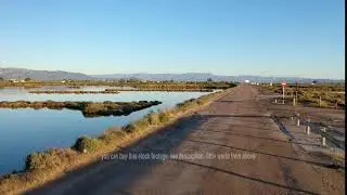 Aerial Stock Footage: Flying with Drone over beautiful Nature with empty Street in Spain | 4k