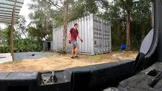 Moving a shipping container with no heavy equipment