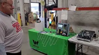 Safety PLC, safety area scanner, smart stack light, coordinated servos, and VFD.
