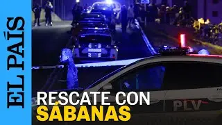 DANA VALENCIA | Un policía salva una vecina de Benetusser atando sábanas | EL PAÍS