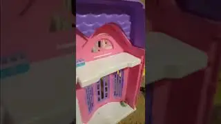 Natalie decorates her doll house with shopkins and hatchimals.
