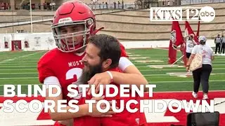Blind high school senior fulfills football dream