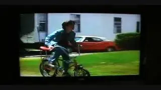 Jumanji Bicycle Chase Scene