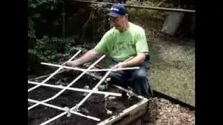 Square Foot Garden  -  Broccoli protective cover from flying insects.