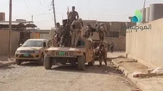 الفرقة التاسعة وفوج طوارئ شرطة نينوى الثاني يجريان عمليات تفتيش وتدقيق في حي  التنك بأيمن الموصل