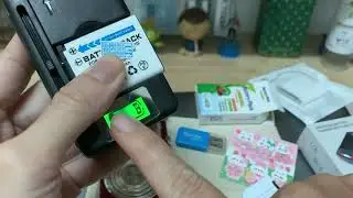 Hdan sạc pin Nikon S570