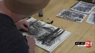 Bend man turns charcoal from burned forest into art