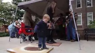 Little boy buck dancing with Uncle Shuffelo & His Haint Hollow Hootenanny
