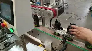 Side sticker labeling machine with top pressing system