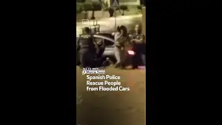 Spanish Police Rescue People From Flooded Cars