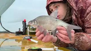 Fishing for bream in an ice tent. Fishing on a reservoir. Fishing 2026