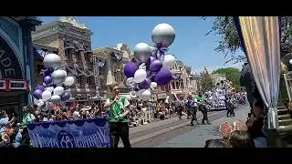 July 17 Anniversary noon celebration Character Cavalcade Leads Mickey Mouse March to Town Square.