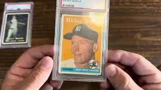 A closer look at the Mickey Mantle cards from the display case.