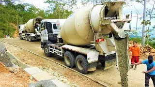 Roadside Concrete Paving By Hino 500 Ready Mix Cement Trucks