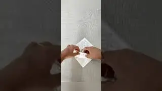 Dobradura  em guardanapo de papel.