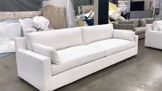 White 10 feet sofa with slim track arms