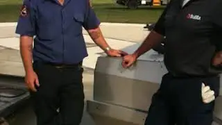 Australian Capital Territory Rural Fire Service [ACTRFS] Capt reviews the live fire car fire prop