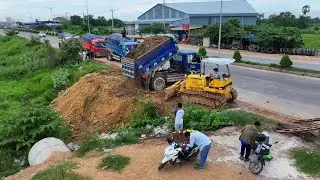 Amazing bulldozer!! skill pushing soil filling land with dump trucks