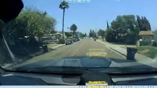 Close call with a stop sign runner