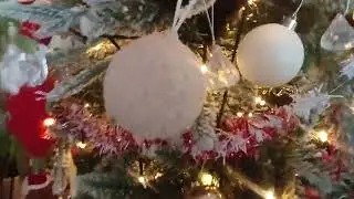 My dumb teenage cat in the christmas tree 