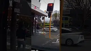 Dashcam footage captured a strong gust of wind blowing over a pedestrian sending them in the street