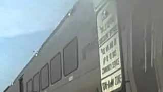 Opposite railed NJT train flies by Rutherford