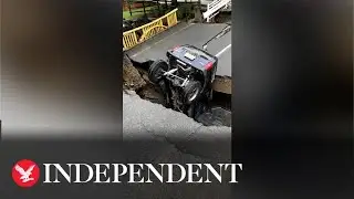 Video shows aftermath of Japanese road washed away in heavy flooding