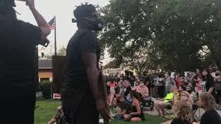 Crystal Vernon speaks at Dunedin Vigil at Pioneer Park, with Robert Peirson