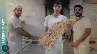 The game of Iranian Sangak bread with fire in the oven covered with stones!