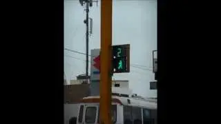 Walk Sign in Lima, Peru with Moving Green Figure