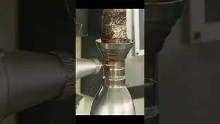 Mass production process of cola shaped sports bottle