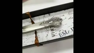 Vintage-style Letter Opener with Classic Metal Detailing - Silver