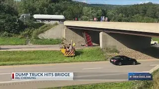 Dump truck from Elmira Heights company hits bridge on I-86 in Chemung
